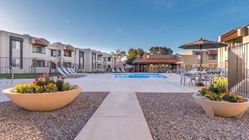 Riverstone pool view with relaxation areas and nice leading path
